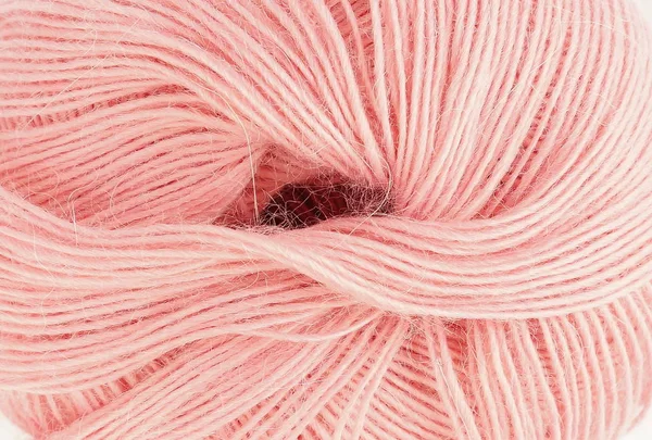 Soluk pembe örgü yün. Yakın çekim