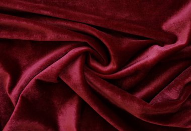 Kadife doku kırmızı arka plan rengi. Noel şenlikli baskground. pahalı lüks, kumaş, malzeme, bez. Kopya alanı.