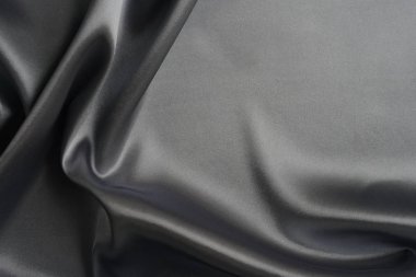 Kumaş ipek saten doku arka plan silber rengi. Lüks kumaş dalgasının arka plan.