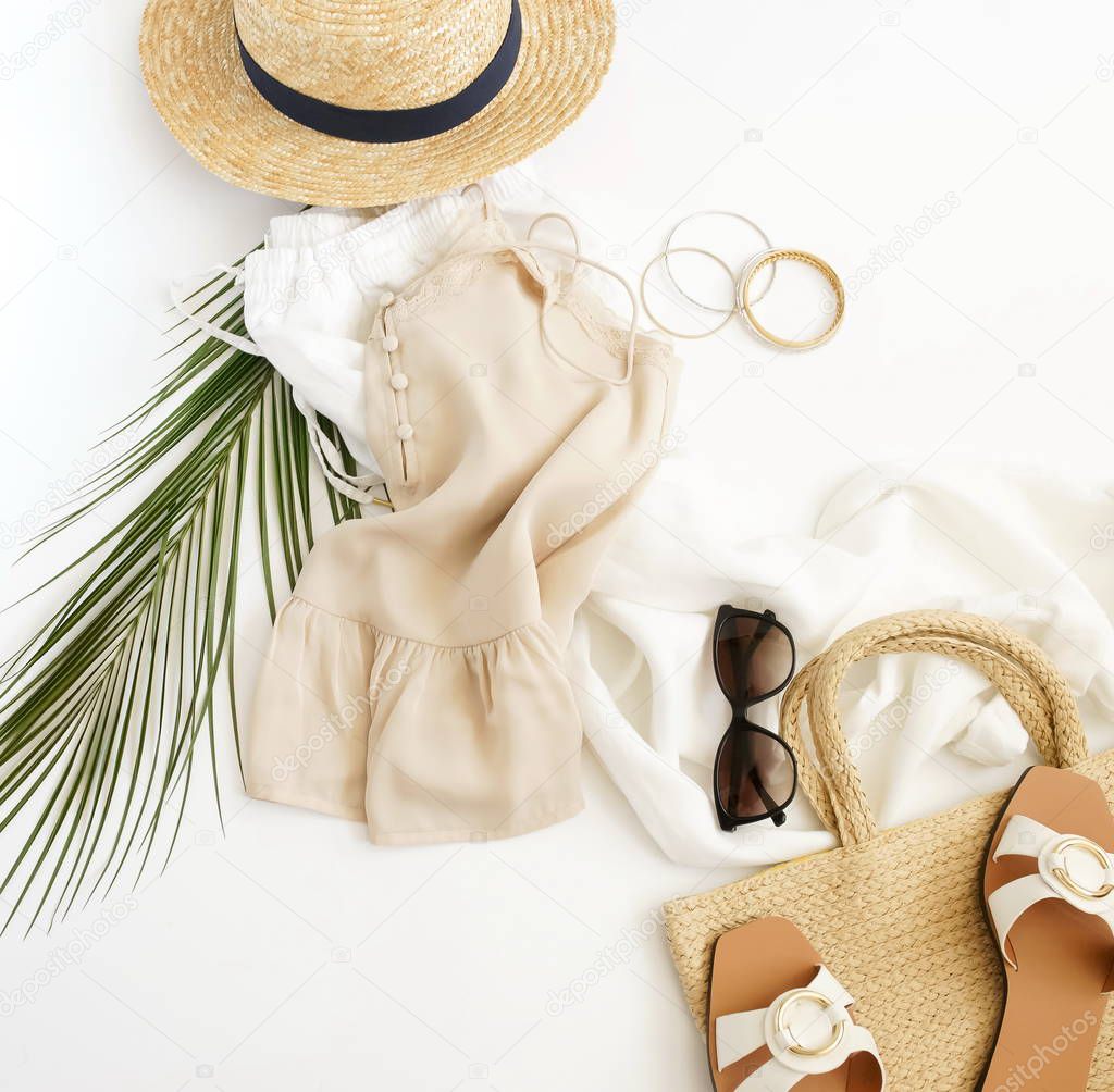 beautiful feminine summer outfit on white background
