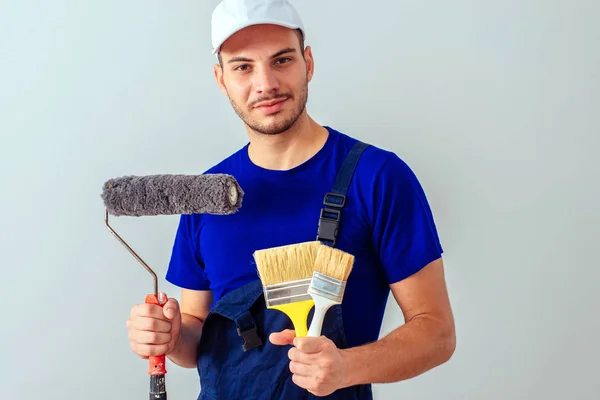 Portrait Craftsman While Holding Paint Roller Brushes Wall — Stock Photo, Image