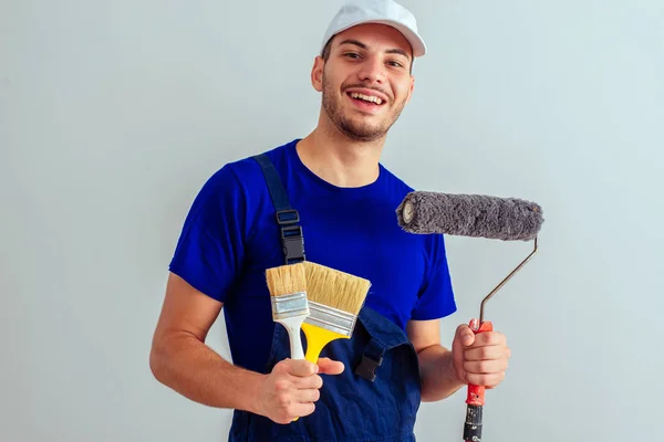 Portrait Craftsman While Holding Paint Roller Brushes Wall — Stock Photo, Image