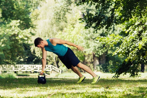 Attractive Fitness Instructor Doing Heavy Weight Exercise Kettlebell Park — Stock Photo, Image