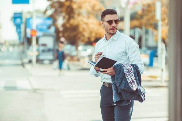 Businessman Suit Looking Him City While Holds Pen Opened Notebook — Stock Photo, Image