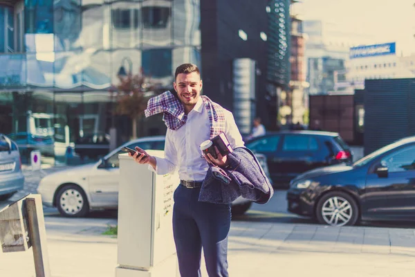 Urban Businessman Windy Day Holding Notebook Phone Enjoying Wind — Stock Photo, Image