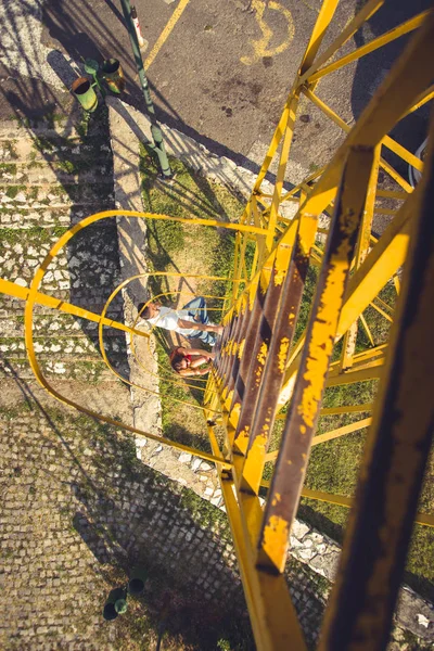 Boy Girl Trying Climb Metal Ladder Reach Top Metal Construction — Stock Photo, Image