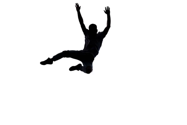 Sylwetka nowoczesny chłopiec skoki — Zdjęcie stockowe