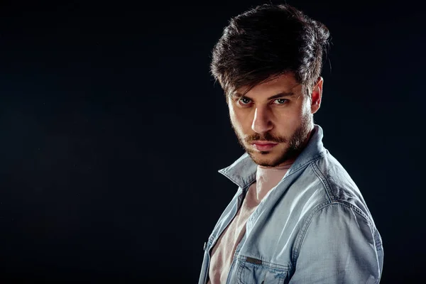 Young man model posing in the studio — Stock Photo, Image