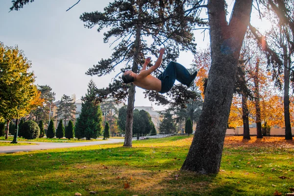 Parkour man in action while doing parkour tricks — Stock Photo, Image