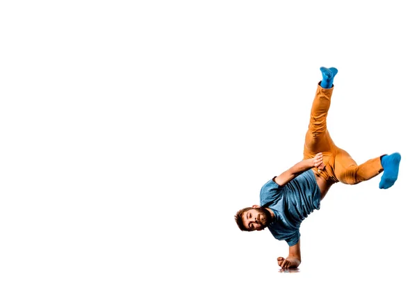 Man perform dancing while doing one hand stand — Stock Photo, Image