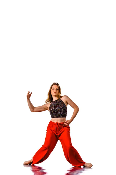 Modern teenage girl dancer against isolated on a white backgroun — Stock Photo, Image