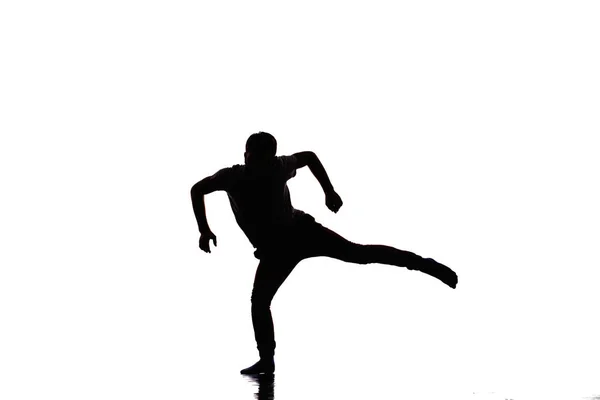 Handsome dancer posing on a studio background — Stock Photo, Image