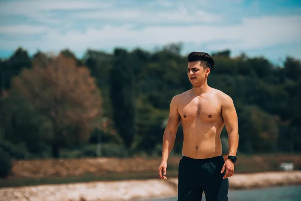 Young man with a defined body — Stock Photo, Image