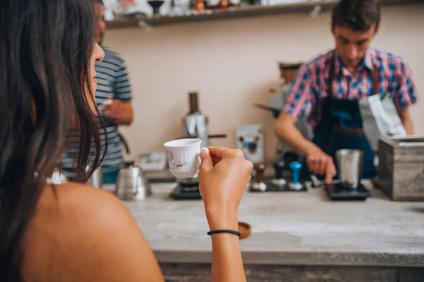 Handsome barista making a cup of coffee at the coffee shop — Stock Photo, Image