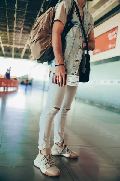 Casually Dressed Man Backpack Tickets Looking Timetable While Standing Airport — Stockfoto