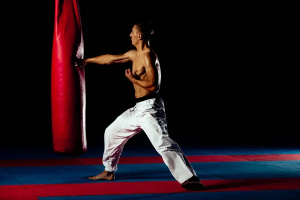 Muscular Handsome Fighter Giving Forceful Forward Kick Practise Boxing Bag — Stock Photo, Image