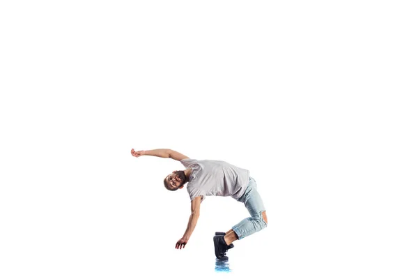 Şaşırtıcı Dansçı Breakdance Beyaz Bir Arka Plan Üzerinde Yapıyor — Stok fotoğraf