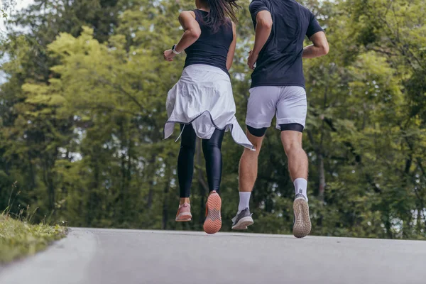 Young Fit Couple Atheltes Running Running Road Forest — Stock Photo, Image