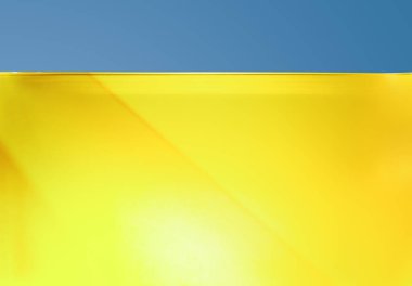 Yağ veya hava kabarcıkları mavi arka plan, sarı sıvı.