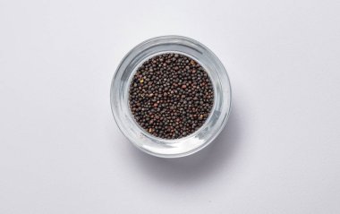 Arka plan üzerinde doğal organik tecavüz tohum makro görünümü