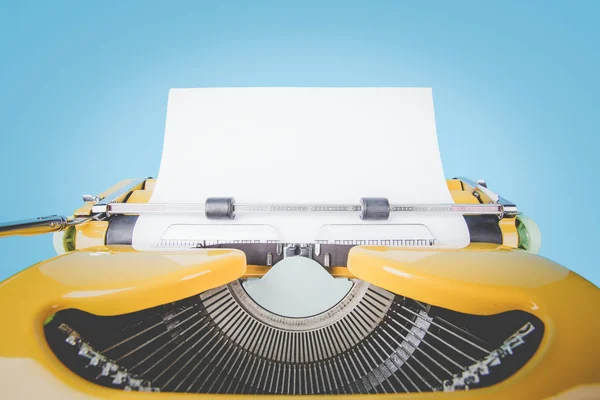 Retro Old Yellow Typewriter Paper Blue Background — Stock Photo, Image