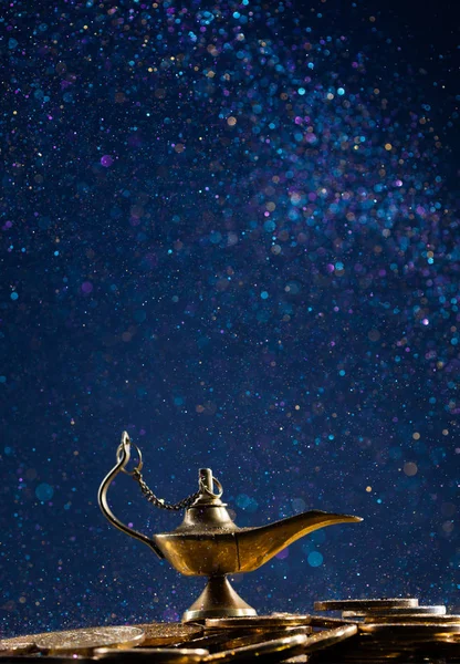 Magic lamp of wishes with smoke coming out from the lamp