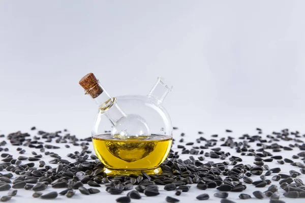 Sunflower seed oil on white background. Studio shooting