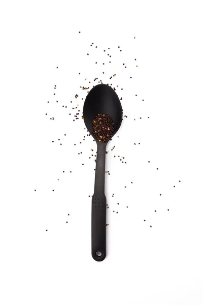 Плоская Укладка Упорядоченной Черной Пластиковой Ложки Семенами — стоковое фото
