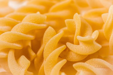 Makro yüzey closeup pişmemiş makarna arka plan. Stüdyo fotoğraf çekim.