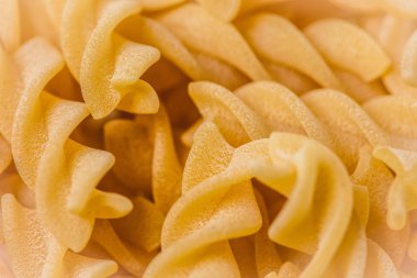 Makro yüzey closeup pişmemiş makarna arka plan. Stüdyo fotoğraf çekim.