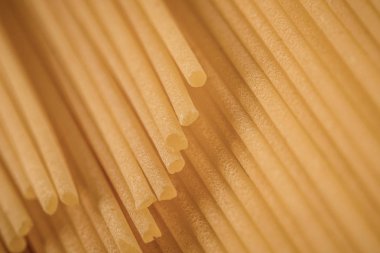 Makro yüzey closeup pişmemiş makarna arka plan. Stüdyo fotoğraf çekim.