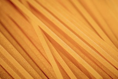 Makro yüzey closeup pişmemiş makarna arka plan. Stüdyo fotoğraf çekim.