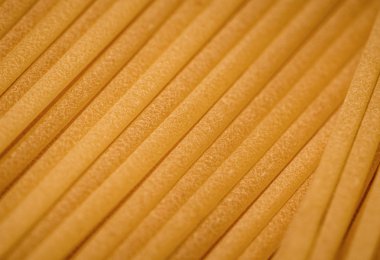 Makro yüzey closeup pişmemiş makarna arka plan. Stüdyo fotoğraf çekim.