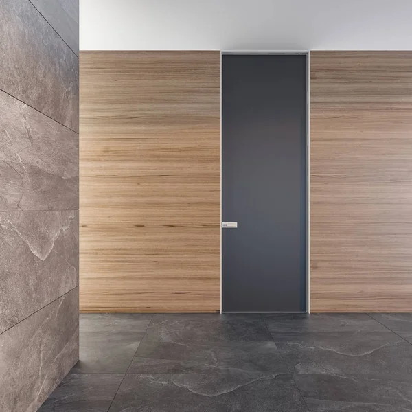 Closed modern door in a room with a stone floor and textured walls Style interior. Concept of an opportunity