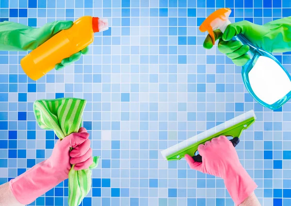Colorful cleaning set for different surfaces in kitchen, bathroom and other rooms on kitchen mosaic surface background. Top view of cleaning service concept. — Stock Photo, Image