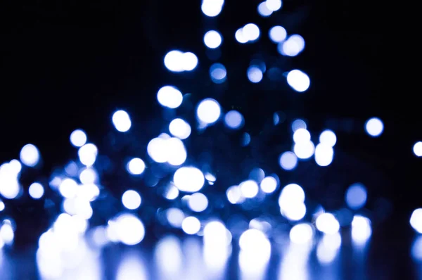 Fond de Noël. Festive élégant fond abstrait avec des lumières bokeh et des étoiles — Photo