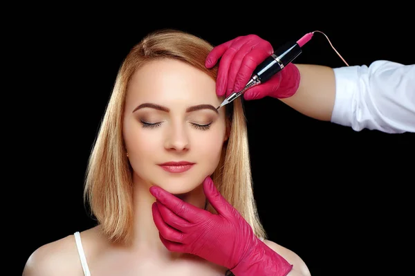 Eyebrows permanent makeup procedure against white background