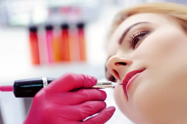 Closeup picture of  lips tattooing