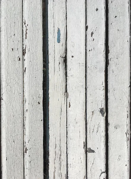 Beyaz boya ile boyanmış ahşap tahtalardan yapılmış eski bir çatlak bank Parçası