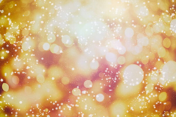 Abstract background of blurred yellow lights with bokeh effect, new year 2019