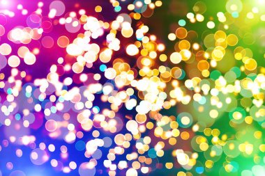 Bokeh soyut dokusu. Renkli. Odaklanmamış arka plan. Bulanık parlak ışık. Dairesel noktalar.