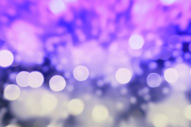 Bokeh soyut dokusu. Renkli. Odaklanmamış arka plan. Bulanık parlak ışık. Dairesel noktalar.
