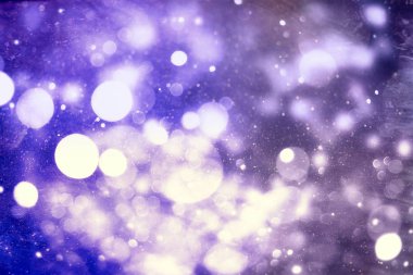 Doğal bokeh ve parlak altın ışıklarla renklendirici arka planı olan klasik Sihirli Arkaplan.