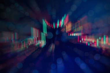 Borsa grafiği öndeki ekranda. Finans ve yatırım konsepti. Seçici odak.