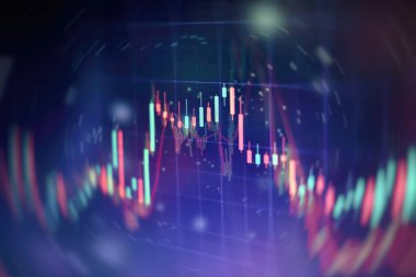 Borsa grafiği öndeki ekranda. Finans ve yatırım konsepti. Seçici odak.