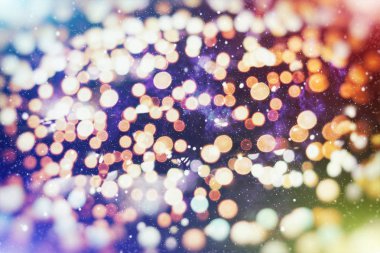 bokeh etkisi ile bulanık sarı ışıkların arka plan