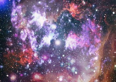 Uzaya karşı parlayan nebula ve yıldız alanı. Bu görüntünün elementleri NASA tarafından desteklenmektedir.