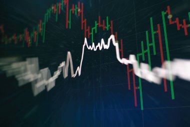 Borsa grafiği öndeki ekranda. Finans ve yatırım konsepti. Seçici odak