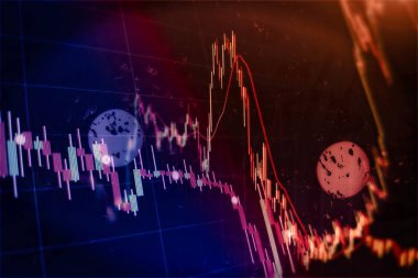 Borsa grafiği öndeki ekranda. Finans ve yatırım konsepti. Seçici odak