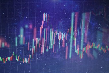 Borsa grafiği öndeki ekranda. Finans ve yatırım konsepti. Seçici odak.